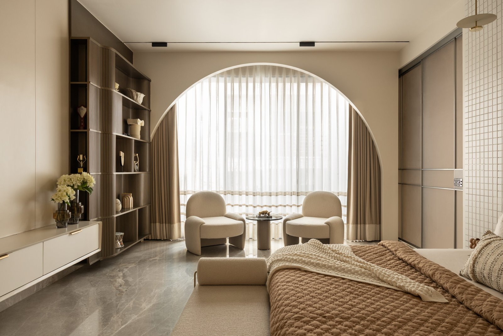 Living area showing furniture integrated with architectural interior design